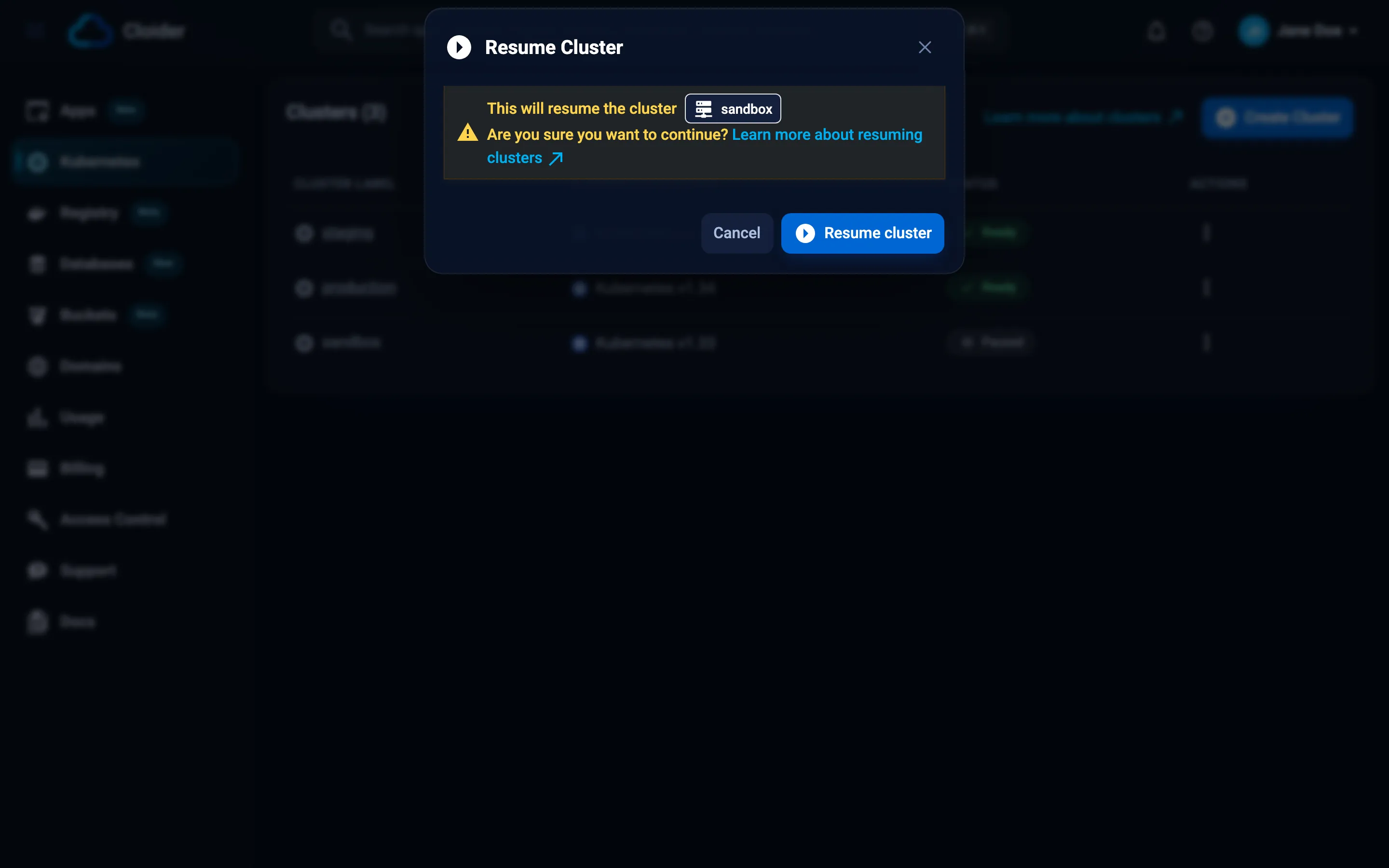 The Resume Cluster dialog asking to confirm resuming the paused cluster staging, with the Cancel and Resume cluster buttons